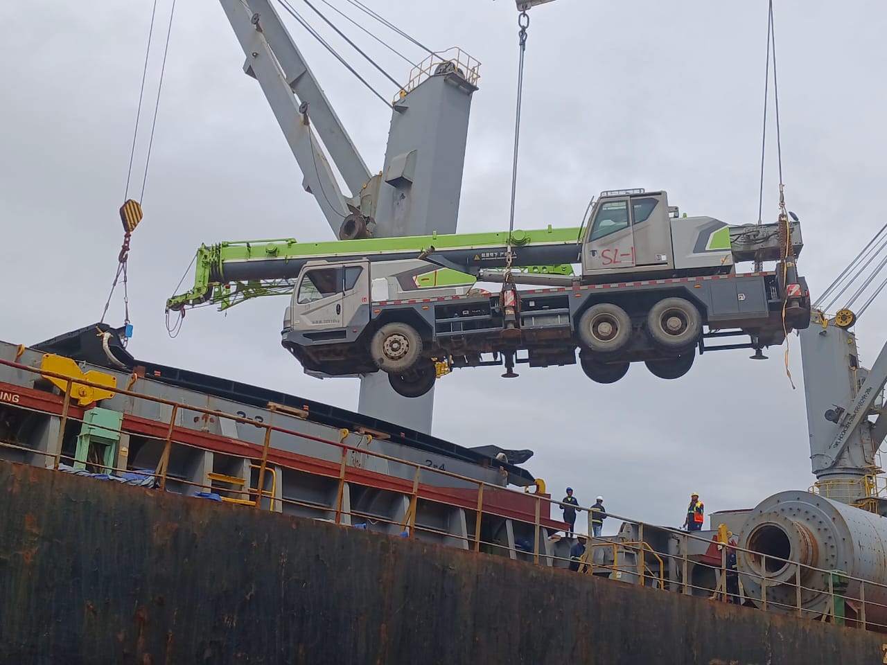 Heavy Crane Being Lifted Onto Ship